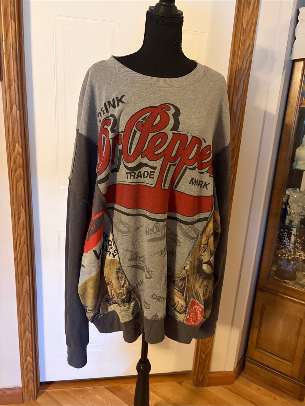 Vintage-Inspired Gray Crewneck Sweatshirt with Red Graphic